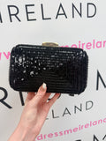 STAR CLUTCH BAG IN BLACK