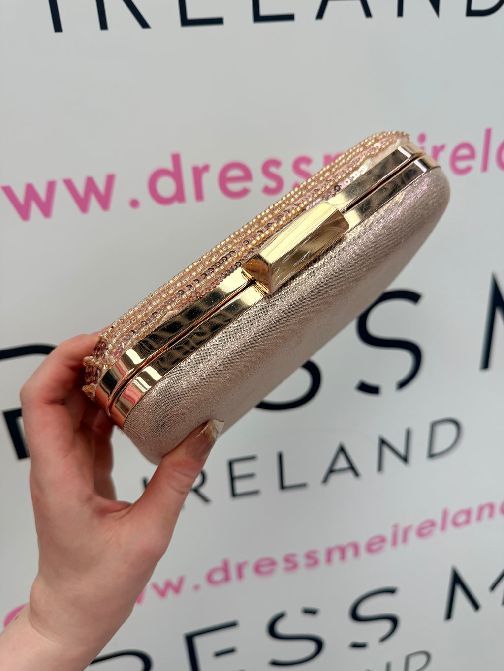 STAR CLUTCH BAG IN ROSE GOLD