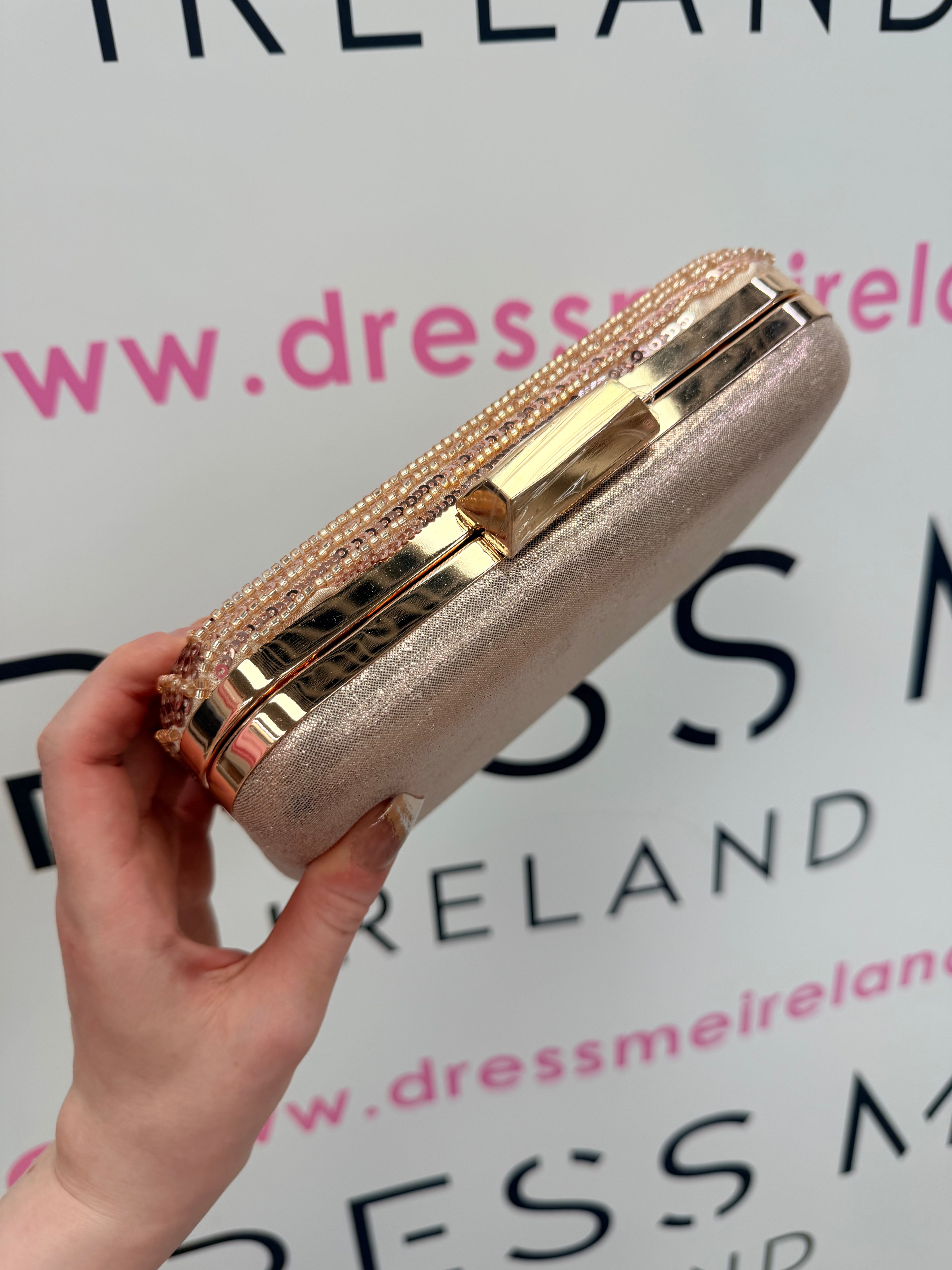 STAR CLUTCH BAG IN ROSE GOLD