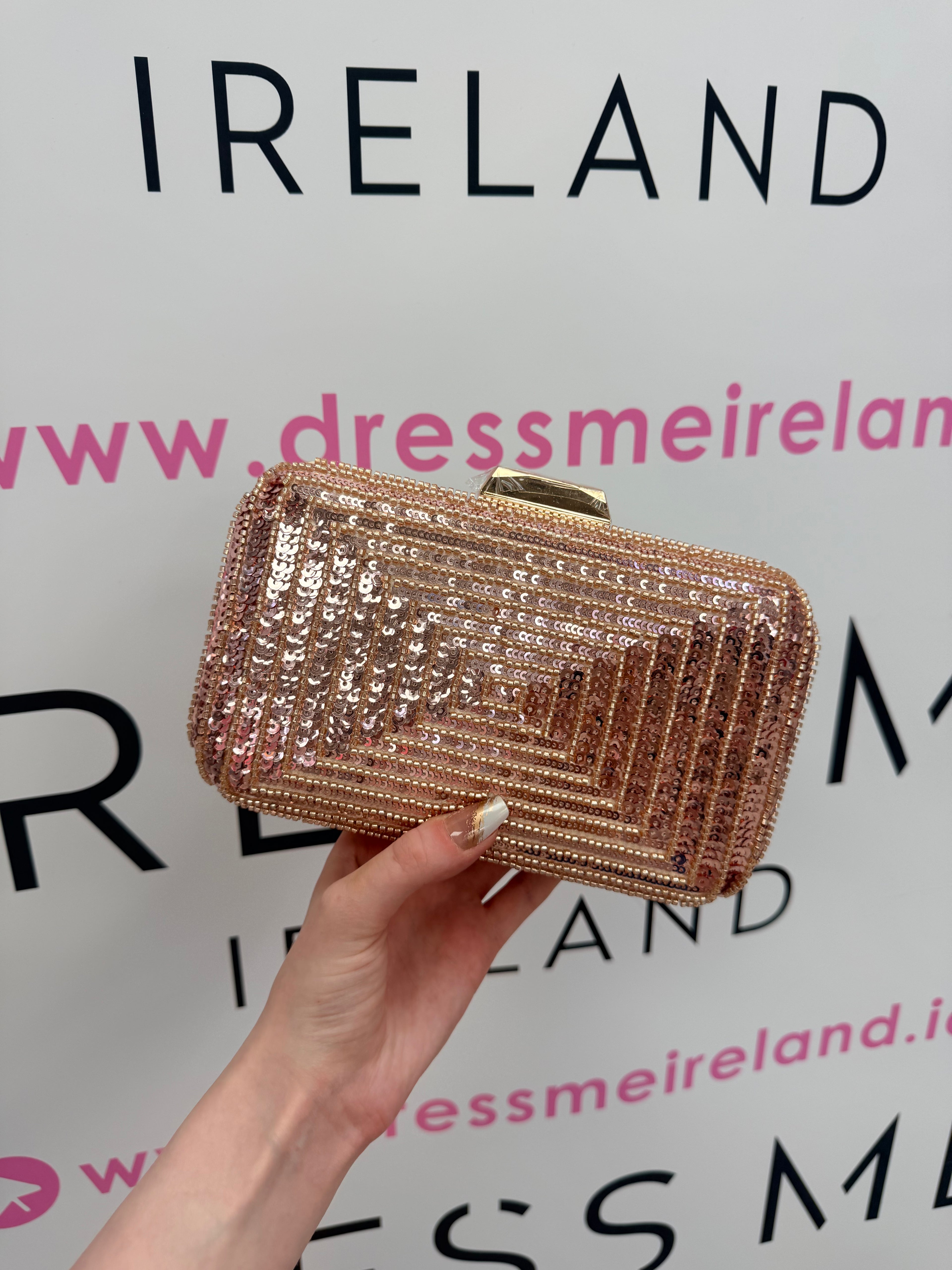 STAR CLUTCH BAG IN ROSE GOLD