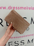 TORI CLUTCH BAG IN ROSE GOLD