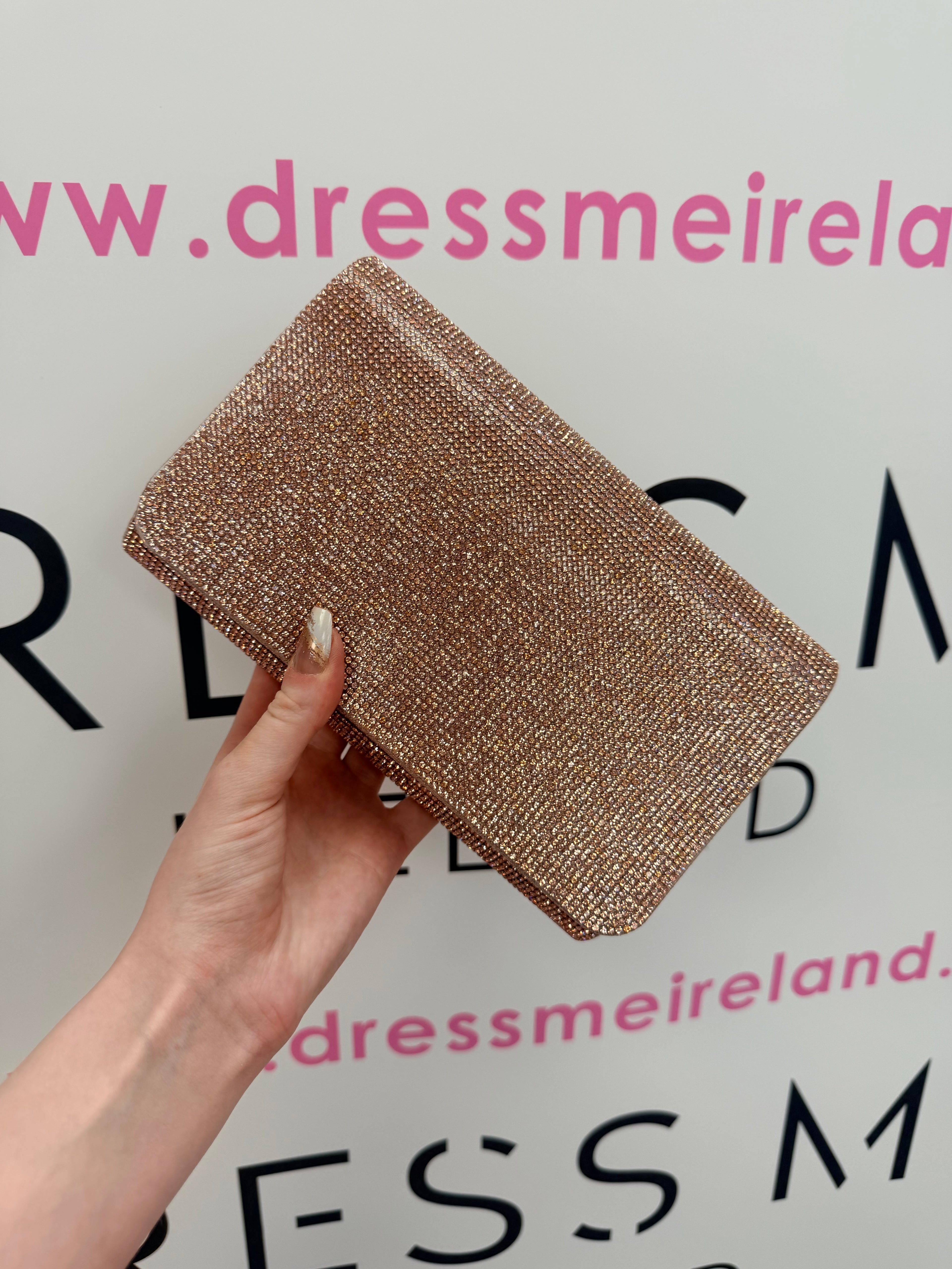 TORI CLUTCH BAG IN ROSE GOLD